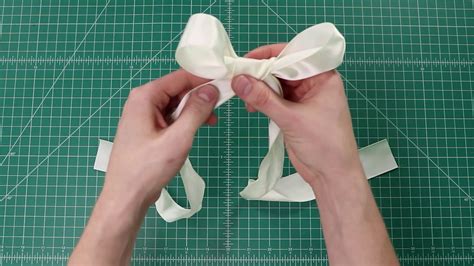 how to tie chanel ribbon|How to tie a bow ribbon for the perfect gi.